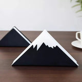 Black metal napkin holder with lotus design by MettiQ