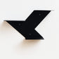 Modern arrow design metal wall shelf in matte black by MettiQ