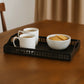 Matte black metal serving tray by MettiQ