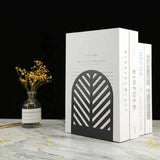Metal leaf bookends with matte black powder-coated finish