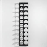Wall-mounted metal shoe rack in matte black finish by MettiQ