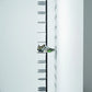 Wall-mounted metal shoe rack in matte black finish by MettiQ